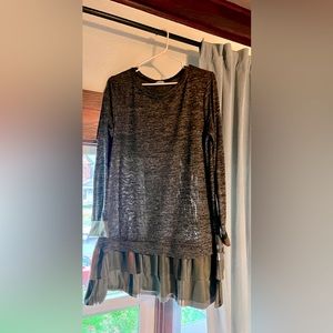 Cute long top with plaid contrast bottom trim